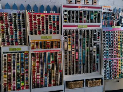 a lot of glasses that are on display in a store
