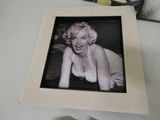 a black and white photo of a marilyn monroe in a picture frame