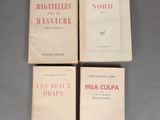 three books on a table, one of which has a title and the other of which is in french