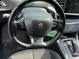 dashboard view of a car with a steering wheel and dashboard controls