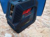 a close up of a box with a tape measure in it on a table