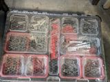 a plastic box with many different tools in it