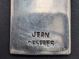 a close up of a silver spoon with the word jean despres engraved on it