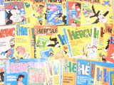 a lot of comic books on the table