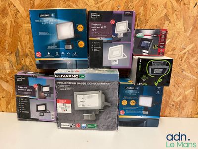 several boxes of electronic devices are stacked on top of each other