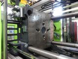 a machine that is working on a piece of metal