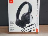 a box with a pair of headphones on top of it