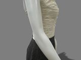 an image of a mannequin wearing a black and white dress