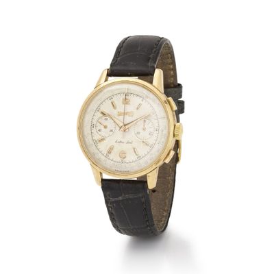 an 18k yellow gold chronograph wrist watch