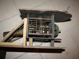 a small machine that is sitting on a tile floor