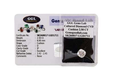 a close up of a card with a diamond on it