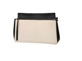 a black and white purse with a zipper on the front