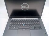 dell laptop computer with dell logo on the screen and keyboard