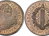 a coin with an image of a woman and a sword on it