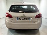 a white car that is parked in a garage