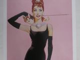 L'affiche du film « Petit déjeuner chez Tiffany » montre une femme en robe noire