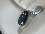 a car key in the back seat of a car