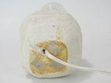 a piece of bread with a patch of tape on it