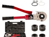 une image représentant un ensemble d'outils comprenant un coupe-tube, des clés à molette et d'autres outils