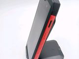 a cell phone that is sitting on a stand