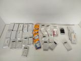 a lot of electronic items that are sitting on the table