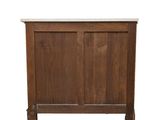an image of a wooden cabinet with a marble top
