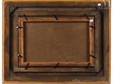 an overhead view of a wooden picture frame with nails on it