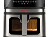 a close up of an air fryer with a digital display