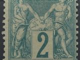 a close up of a stamp with two women on it
