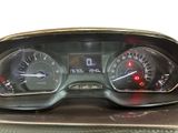 a close up of a car dashboard with a speedometer and gauges