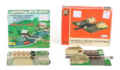 a toy train set with a box and a train on the tracks