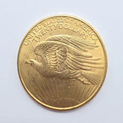une image représentant une pièce d'or sur laquelle figure un aigle