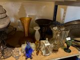 a table with a lot of glass items on it