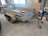 a trailer that is parked inside of a building