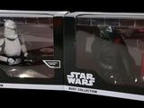 two star wars action figures sit side by side in a box