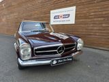 an image of a classic car parked in front of a building