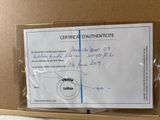 a certificate on a piece of paper with a picture of a basketball player