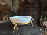 a bowl that is sitting on a table in a room