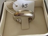 a silver ring in a box with a price tag on it