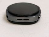 a close up of a cell phone on a table