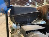 an image of a close up of a machine in a warehouse