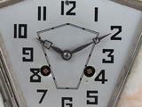 a clock that is sitting on top of a table