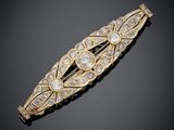 une barrette en or et diamants