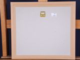 a picture of an easel with a white board on it