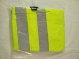 a close up of a yellow and grey bag on a white surface