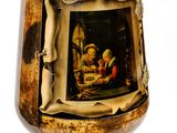 two wine glasses with pictures on them on them