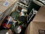many cans and cans of food in a carton