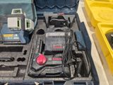 a tool box with tools in it on a table