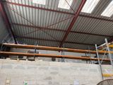 a room with a lot of scaffolding on the ceiling