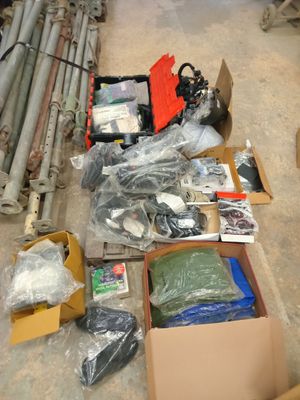 a box of assorted items sitting on the floor